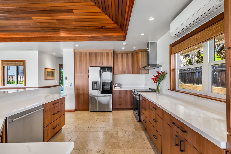 Fully stocked gourmet kitchen with premium appliances and designer finishes for a seamless cooking experience.