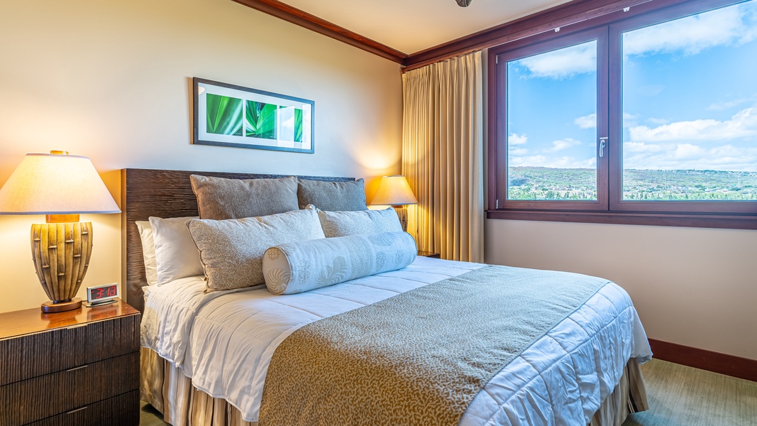 Welcome to the comfortable and stylish primary guest bedroom with views.