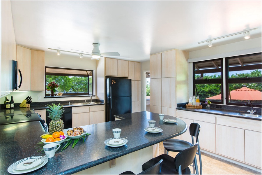 Kitchen, conveniently located near the outdoor patio and dining room.