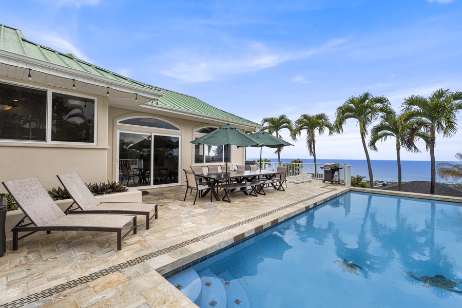 Lounge pool side to soak in the Kona sun