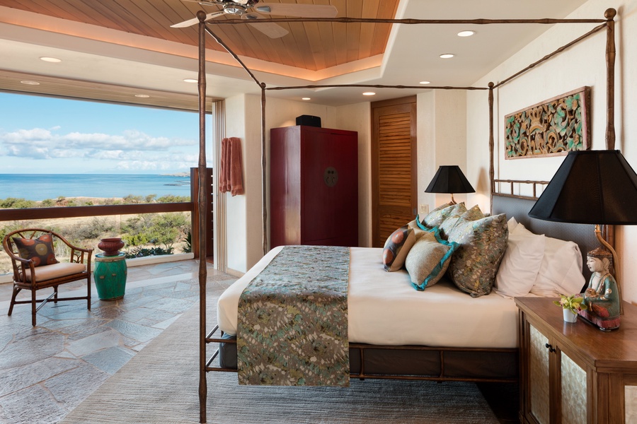 Fourth bedroom with king bed, sliding glass doors, ocean views, flat-screen TV, and en suite bath with special outdoor shower.