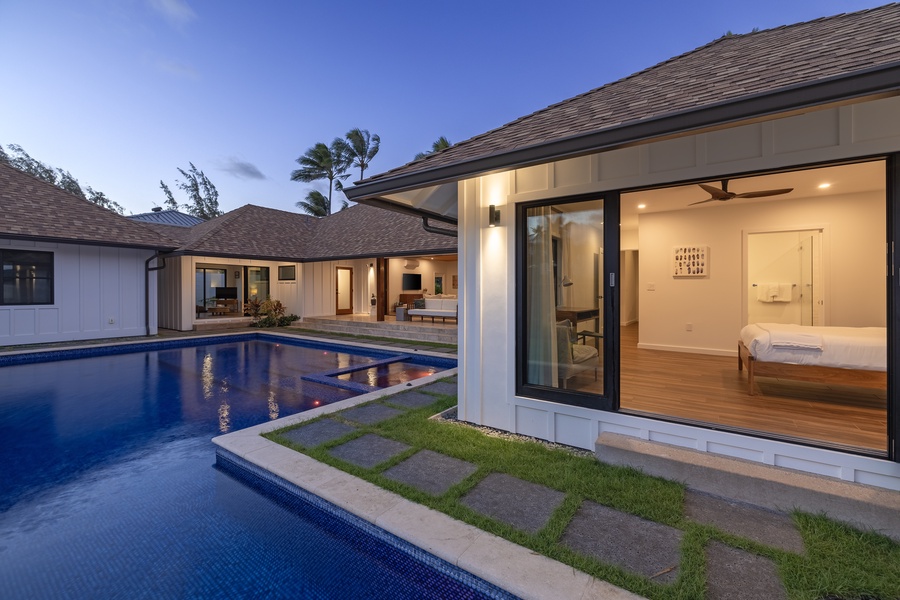 Twilight pool view of Mauka South suite