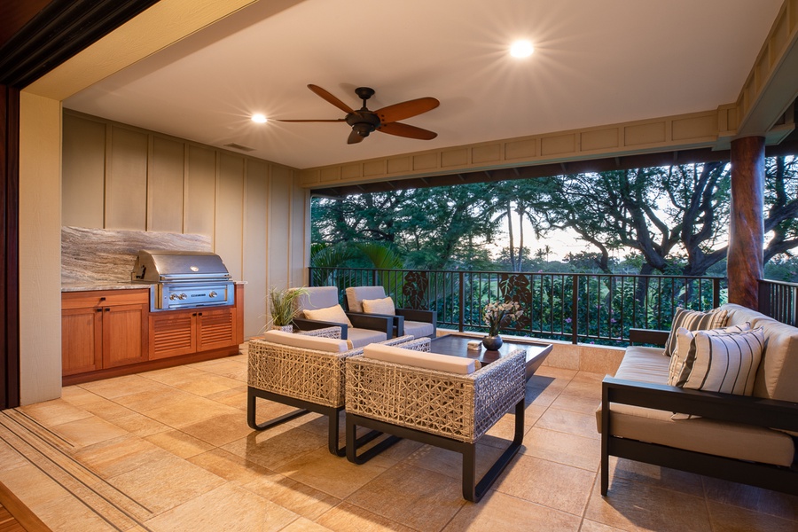 Savor the sizzle from the grill at our upstairs lanai, a gourmet experience nestled amongst comfortable outdoor furnishings.