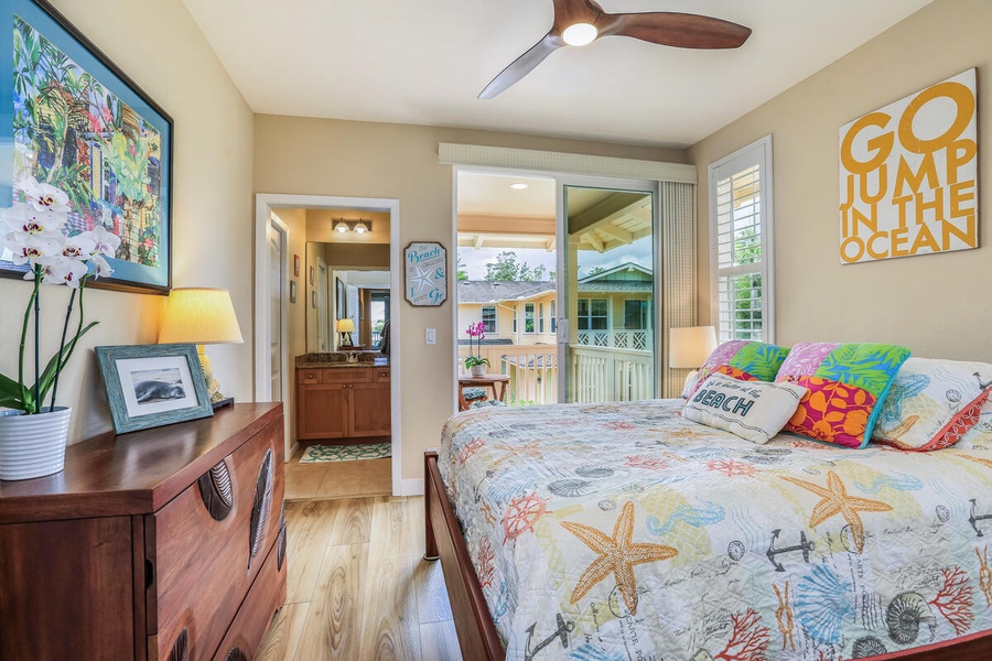 Guest bedroom with a cozy Queen bed and access to a private lanai.