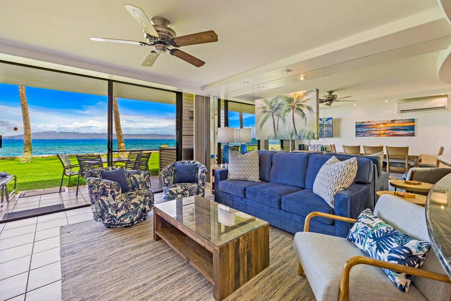 Papakea L-106 offers spacious living room with ocean views, offering a relaxing ambiance and comfortable seating