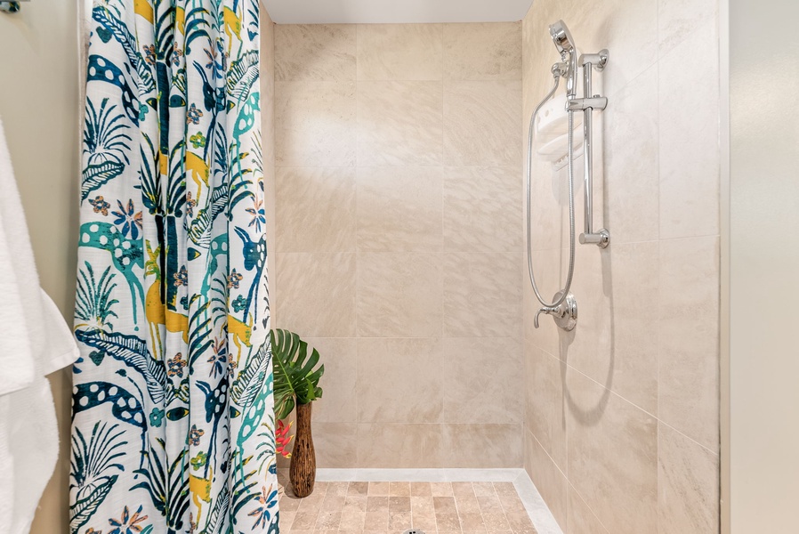 A separate walk-in shower for the ensuite bath.