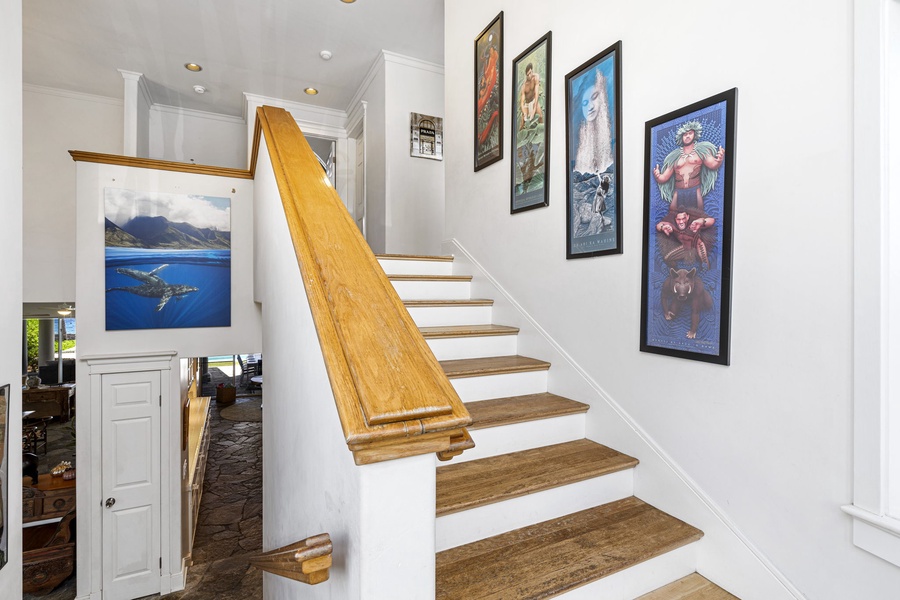 Second interior staircase leading to the upper-level suite.