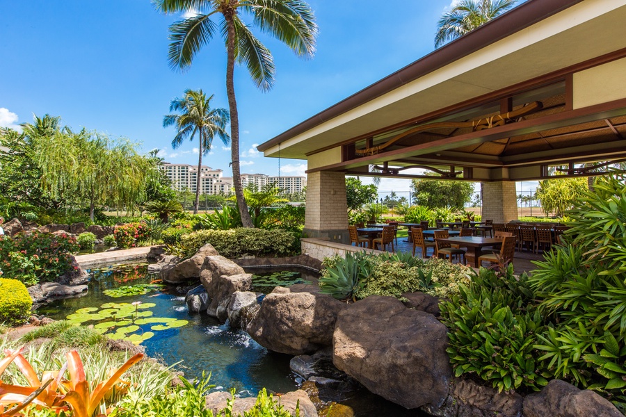 The resort grounds feature tropical landscaping and ponds.