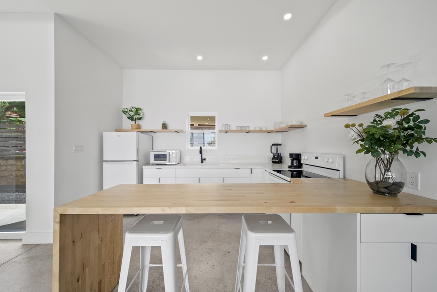 Cozy and functional prep kitchen with ample counter space for your culinary adventures.
