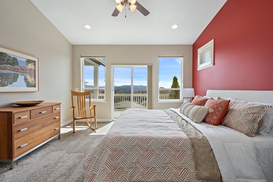 Discover a cozy sanctuary in the master bedroom, with sliders that open up to the balcony, inviting gentle breezes and scenic beauty