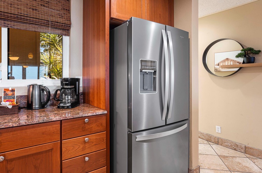 Dual door fridge for ample storage and a coffee corner adjacent to it!