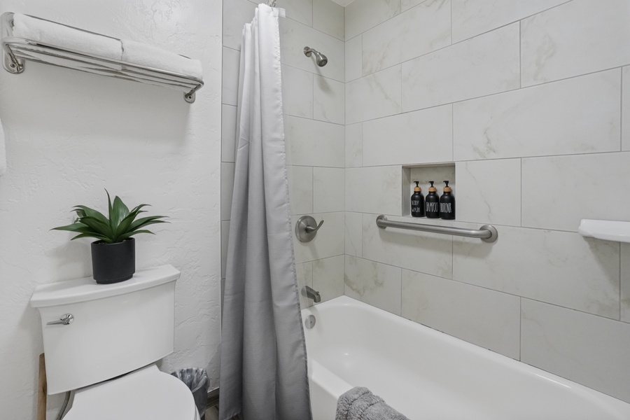 The Updated Bathroom has shower/tub combo.