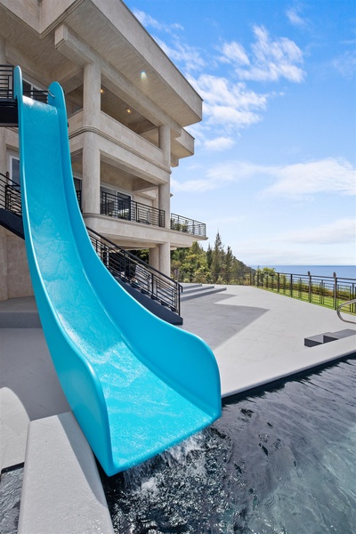 Make a splash down the thrilling waterslide into the infinity pool.