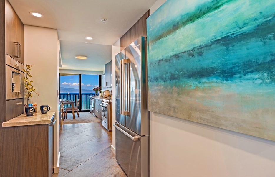 A modern kitchen with ocean views that make cooking feel like a tropical escape.