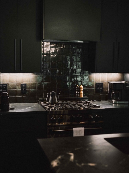 Cook with ease in the modern kitchen featuring sleek finishes and ample prep space.