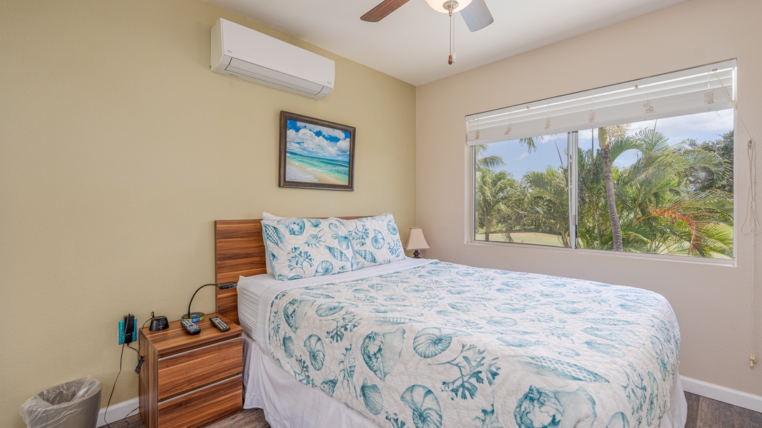 Drift into peaceful slumber in your coastal-themed bedroom, where tropical views through large windows create your own private paradise retreat.