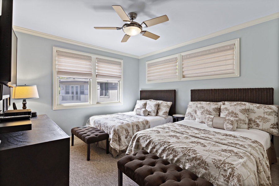 The third bedroom at Wailea Hoolei 93-3 is furnished with two queen-sized beds for ultimate comfort.