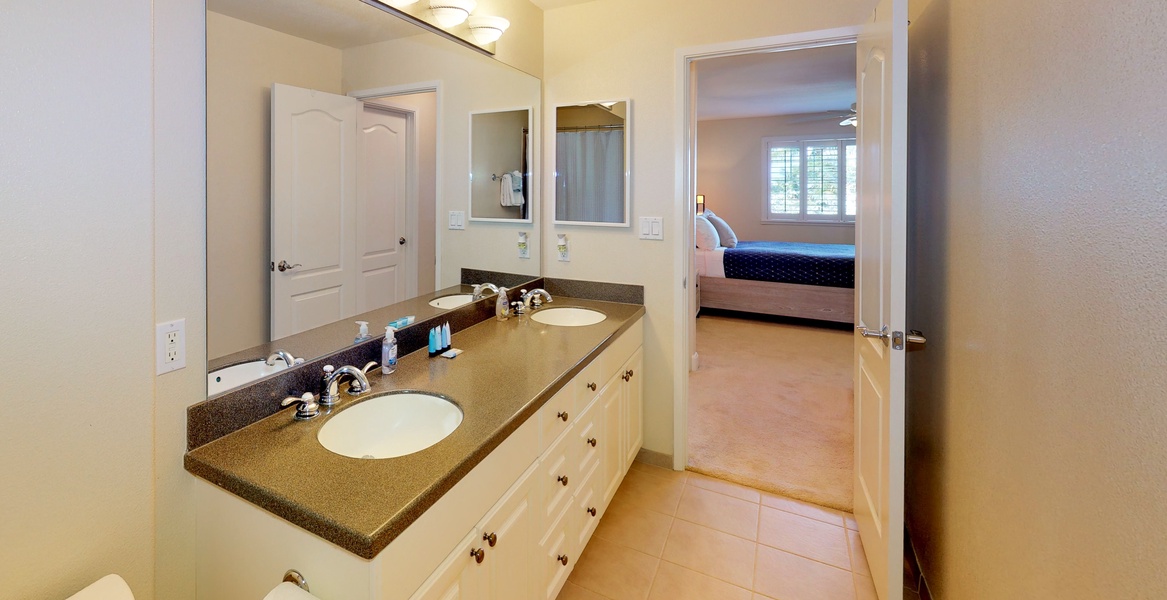 The primary guest bathroom with a double vanity.