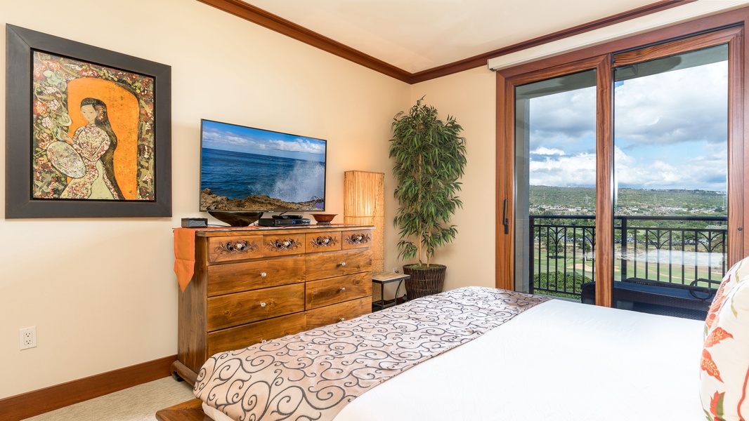 The primary bedroom with breathtaking mountains in the distance.