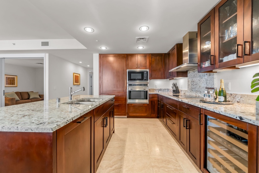 Spacious gourmet kitchen featuring high-end appliances and plenty of counter space for cooking.