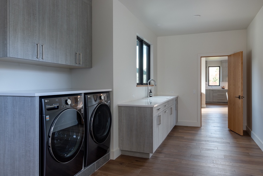 Spacious laundry area with a washer and a dryer