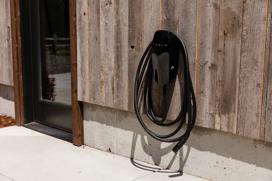 Tesla charger, catering to environmentally conscious guests who travel in electric vehicles