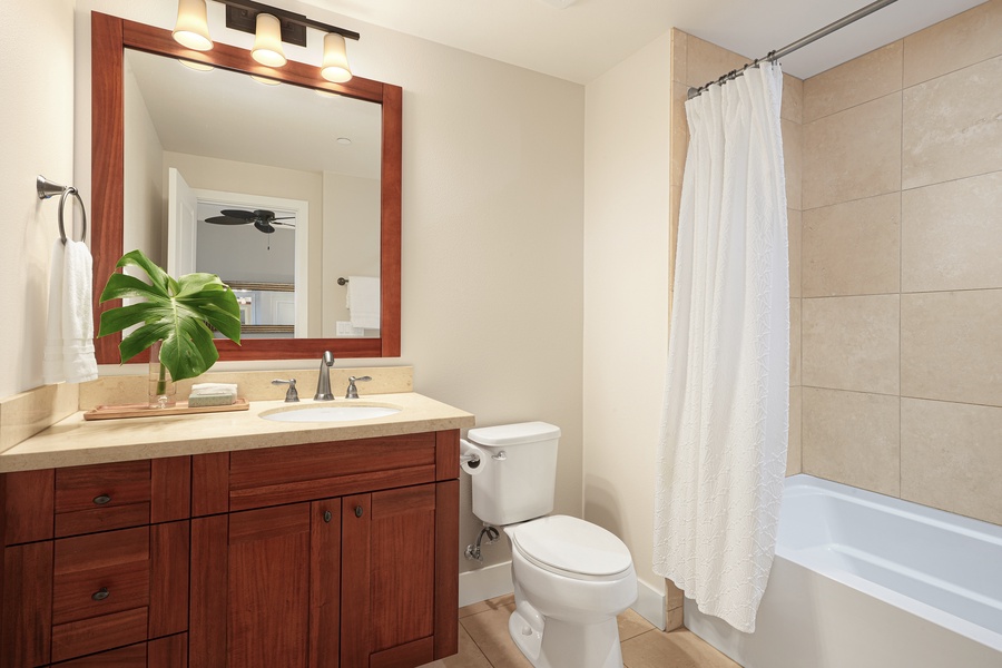 Soak up the day in the modern bathroom.