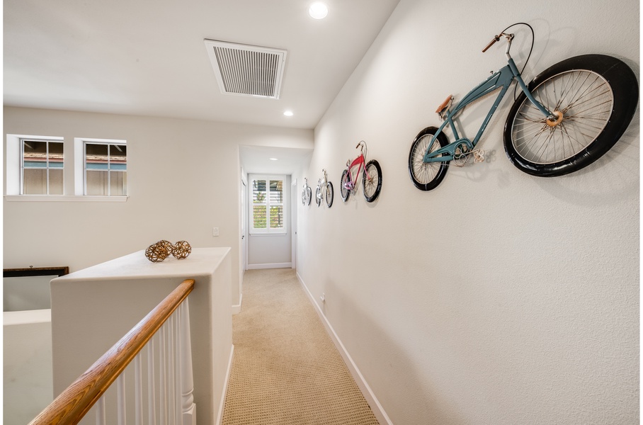 Upstairs you will find the Primary bedroom, the guest suite and two ensuite bathrooms.
