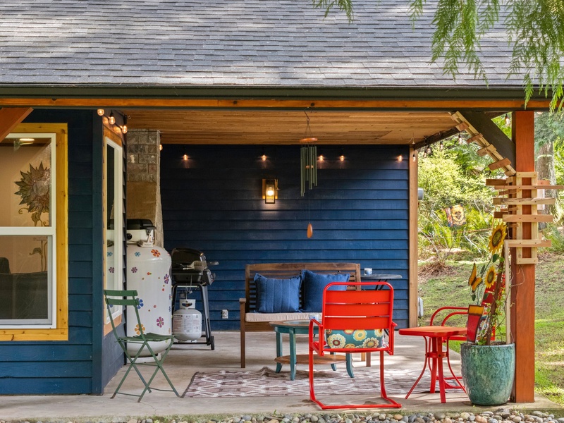 Start your day with coffee or end it with wine on the inviting front porch, perfect for soaking in the wooded serenity.