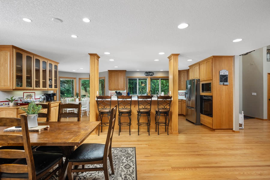 A large kitchen island with barstools for entertaining guests