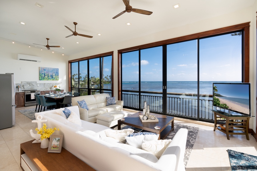 Wall to wall windows with never ending ocean views.