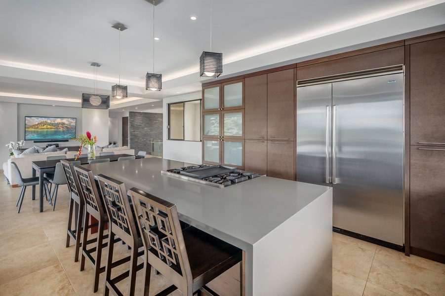 Gourmet kitchen featuring a spacious island with additional seating.