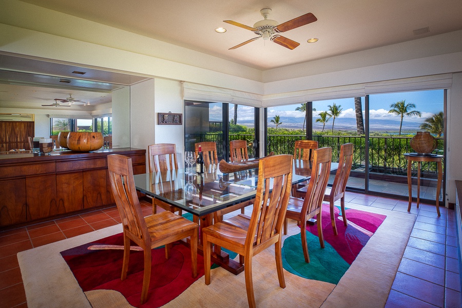 Elegant dining space for eight, featuring ocean views and a seamless indoor-outdoor experience.