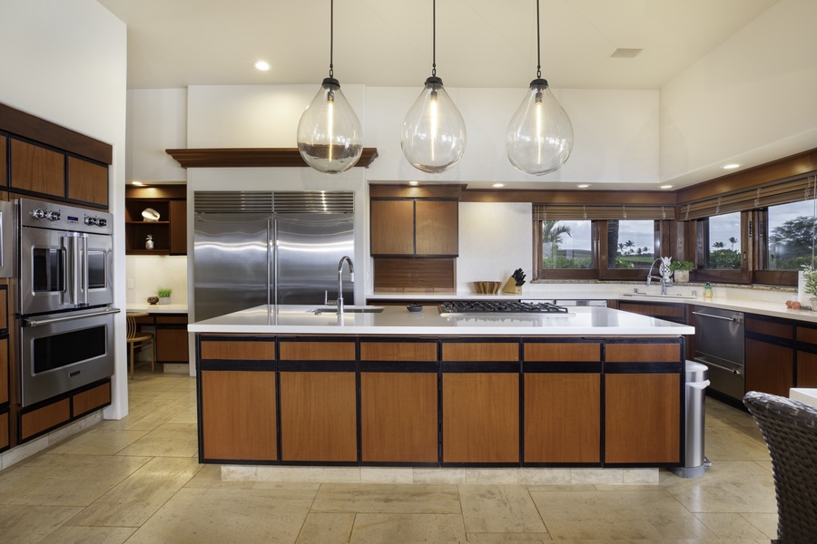 Your gourmet kitchen features premium stainless steel appliances and spacious island for memorable cooking experiences.