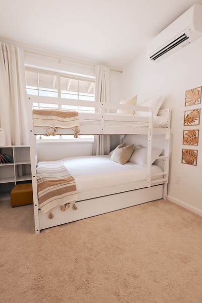 Kid-friendly bunk room with trundle bed—ideal for little adventurers or extended family stays.