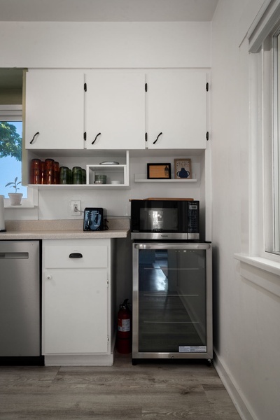 Brew fresh coffee and ease into slow mornings in this thoughtfully stocked kitchenette.