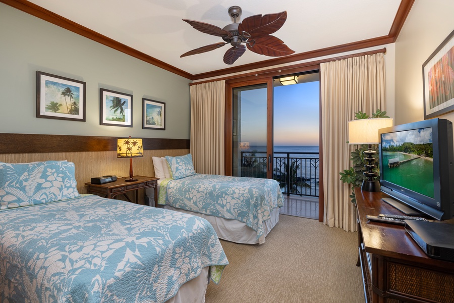 The second guest bedroom with lanai access and incredible scenery.