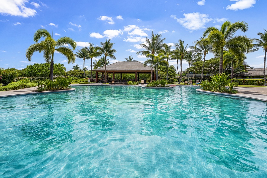 Take a relaxing dip, surrounded by swaying palm trees