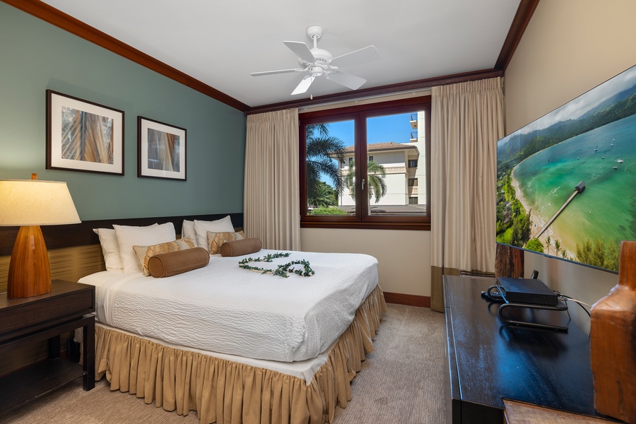 The second guest bedroom showing the twin beds converted to a king bed.