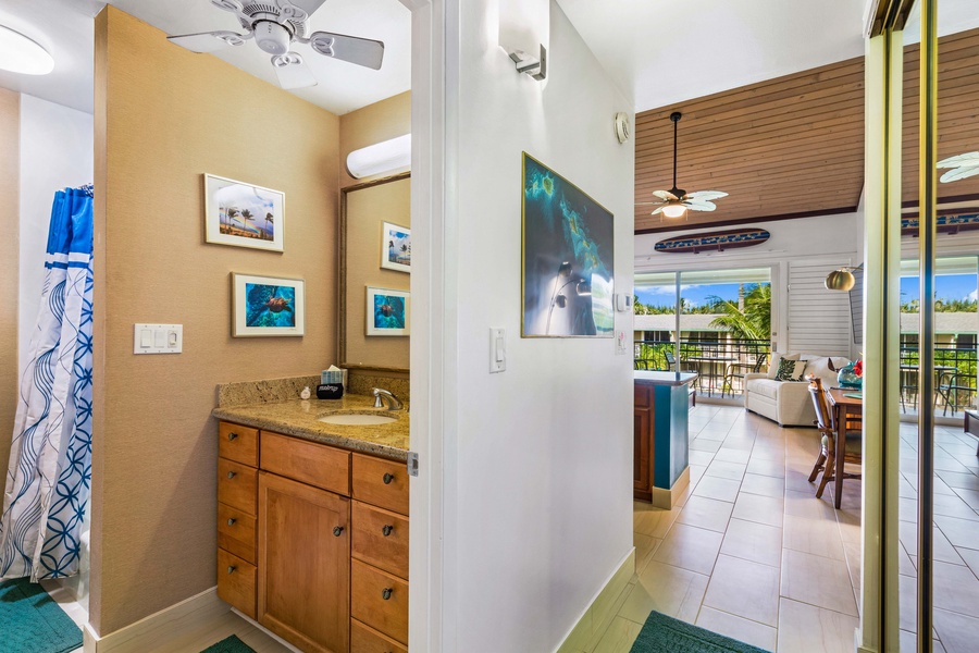Napili Shores F-252 offers easy bathroom access just off the living room for quick refreshes.