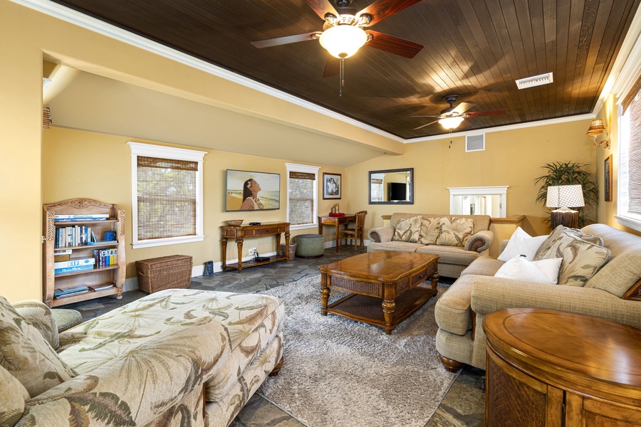 Large smart TV and entertainment setup create a perfect family hangout spot.