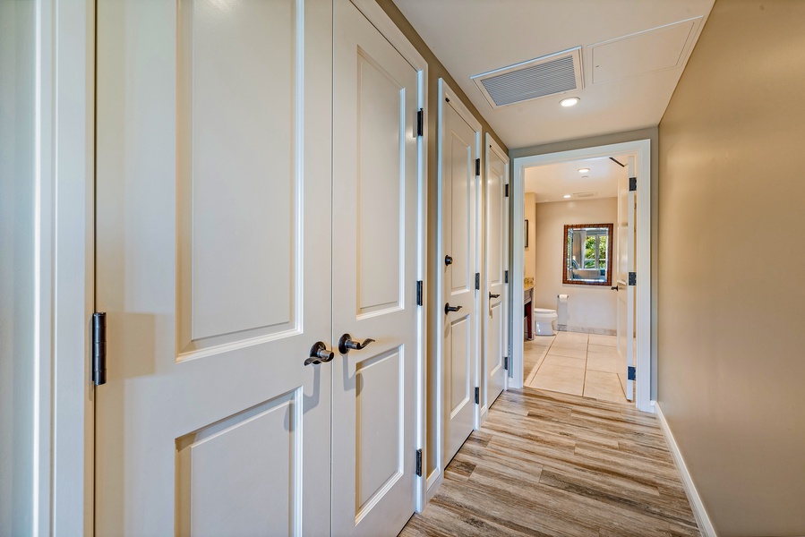 Welcoming hallway leads you into the airy, coastal-inspired interior of Honua Kai Konea 230/232.
