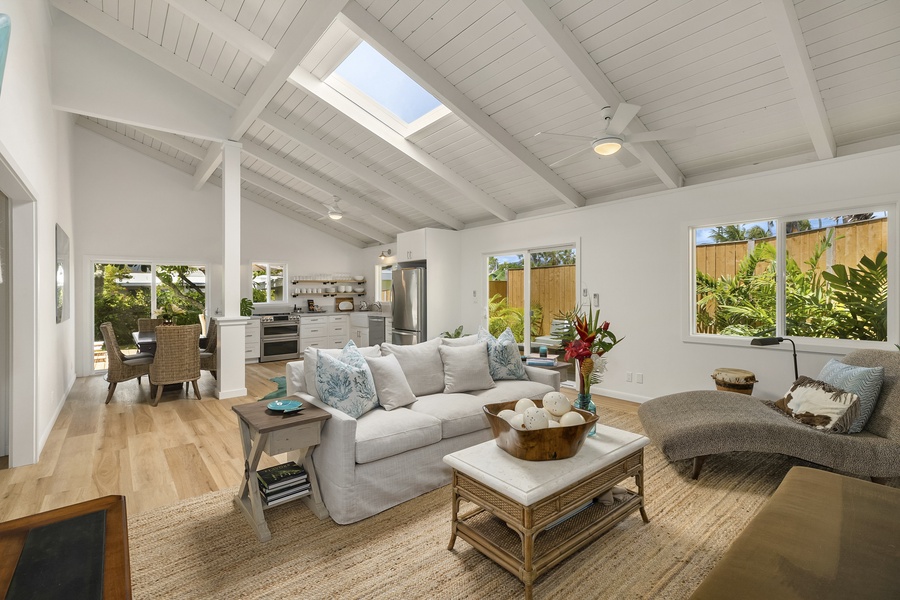 Back House Living Room with Vaulted Ceilings and Open Floor Plan