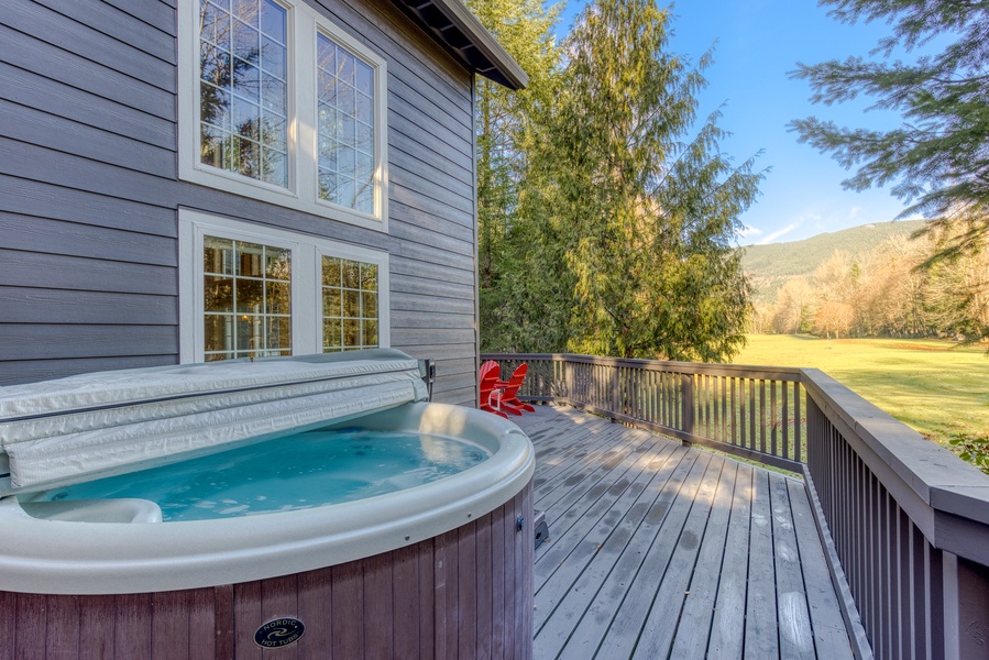 Hot tub on the deck with a golf course  view!