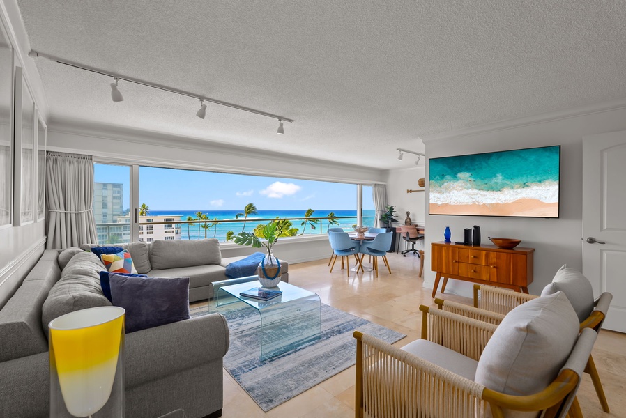 Plush sofas with open space, welcoming the island breeze.
