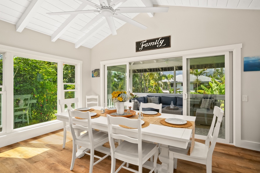 The dining room flows seamlessly into the kitchen, creating a warm and welcoming space for meals and conversations.