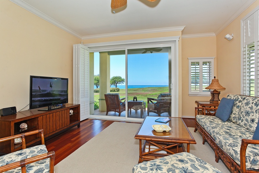The open living area is comfortably appointed with natural lighting and television.