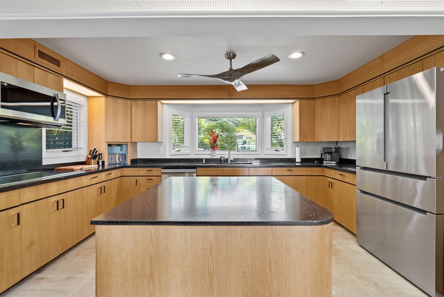 The kitchen area offers expansive counter space for convenient meal prep.