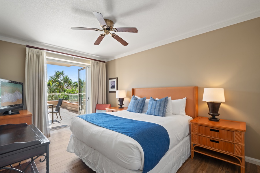 The primary suite of Honua Kai Konea 230/232 opens to the lanai and includes a king bed for restful nights
