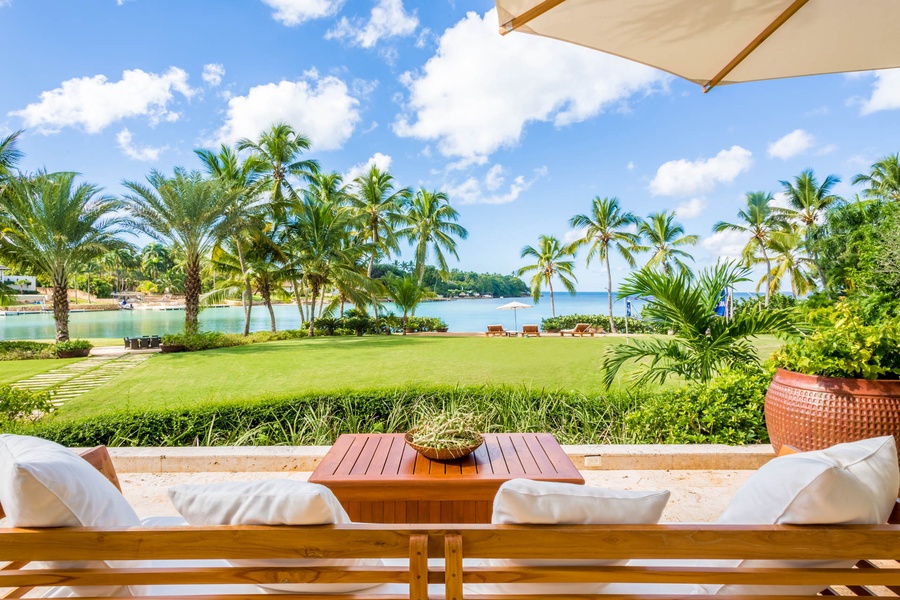 Soak up the sun on the poolside loungers with the serene backdrop of the ocean.